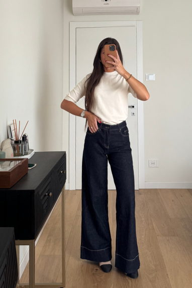 Jeans zampa con orlo alto