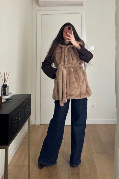 Gilet ecopelliccia con cappuccio