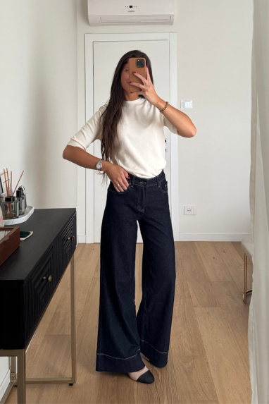 Jeans zampa con orlo alto
