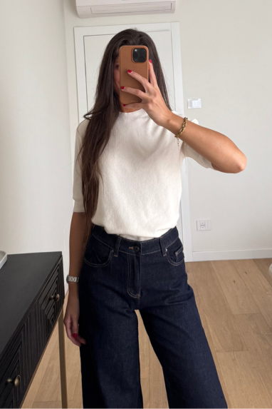 Jeans zampa con orlo alto