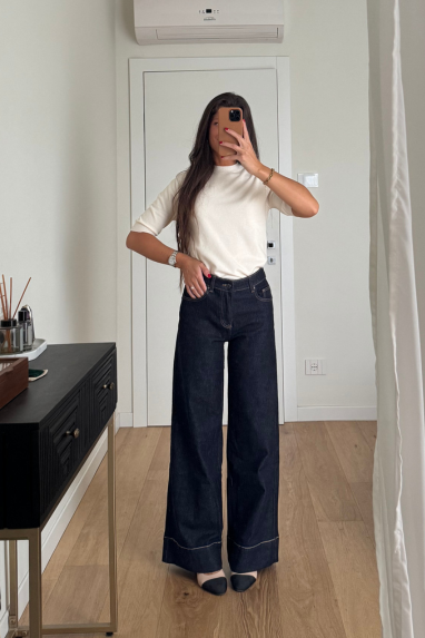 Jeans zampa con orlo alto