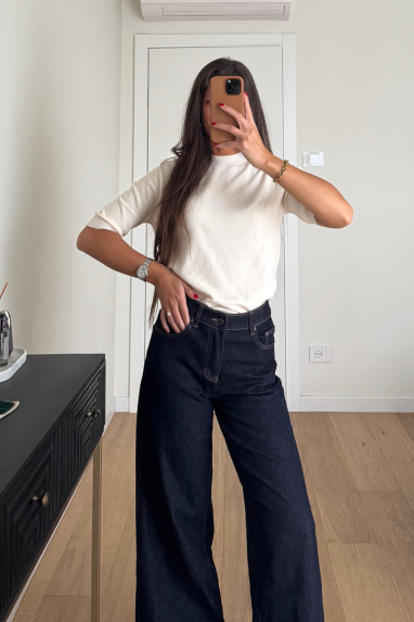 Jeans zampa con orlo alto